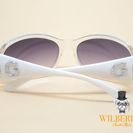GUESS Women's Translucent Crystal Sunglasses (Bidding opens @ R1)