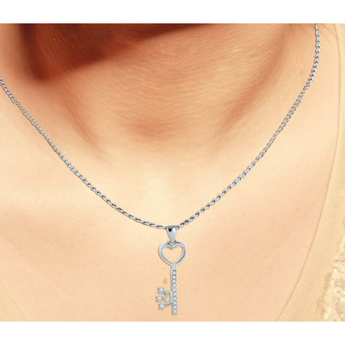 BRITISH JEWELLERS Key Pendant and Solo Studs