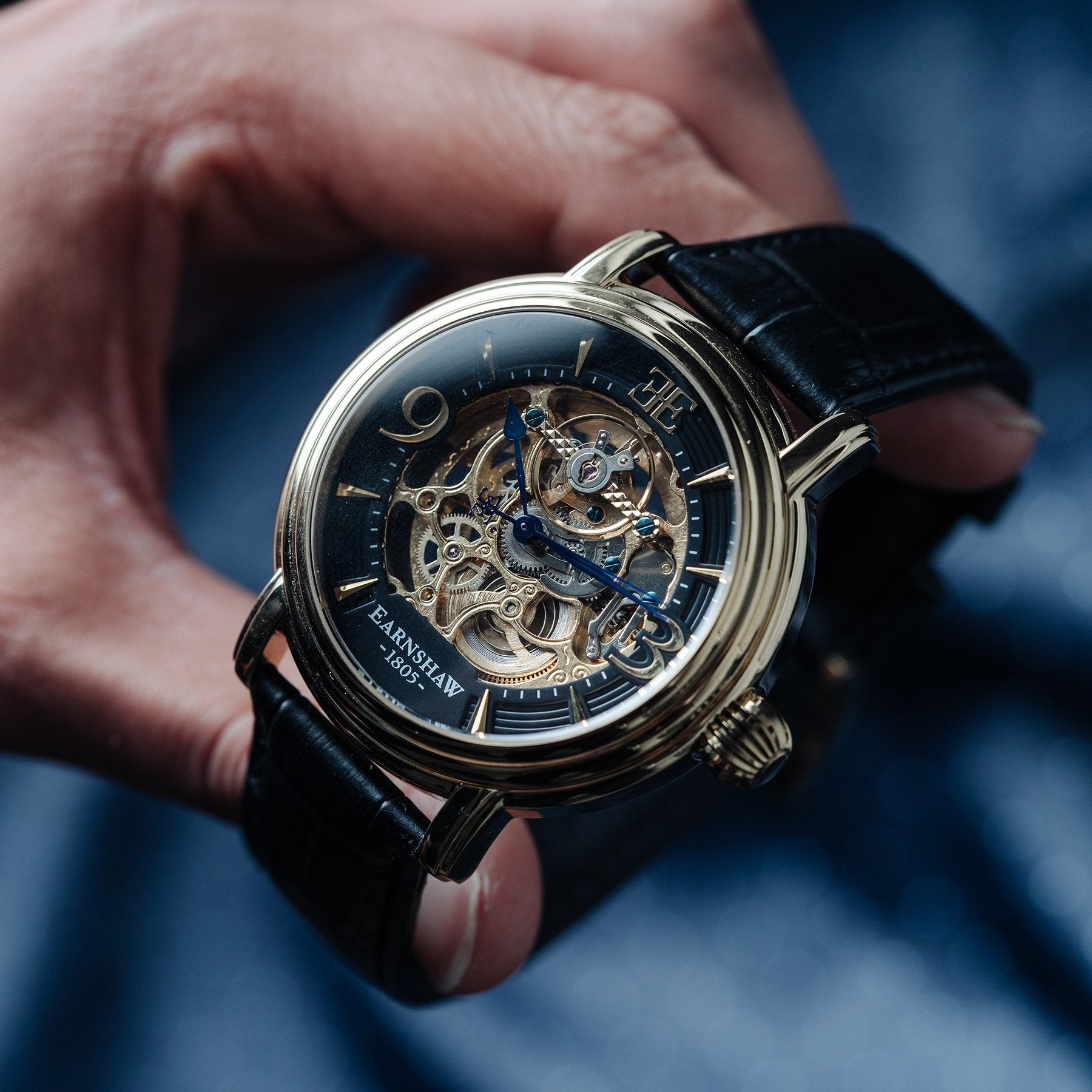 THOMAS EARNSHAW LONGCASE GRANDE SKELETON AUTOMATIC Laurel Gold
