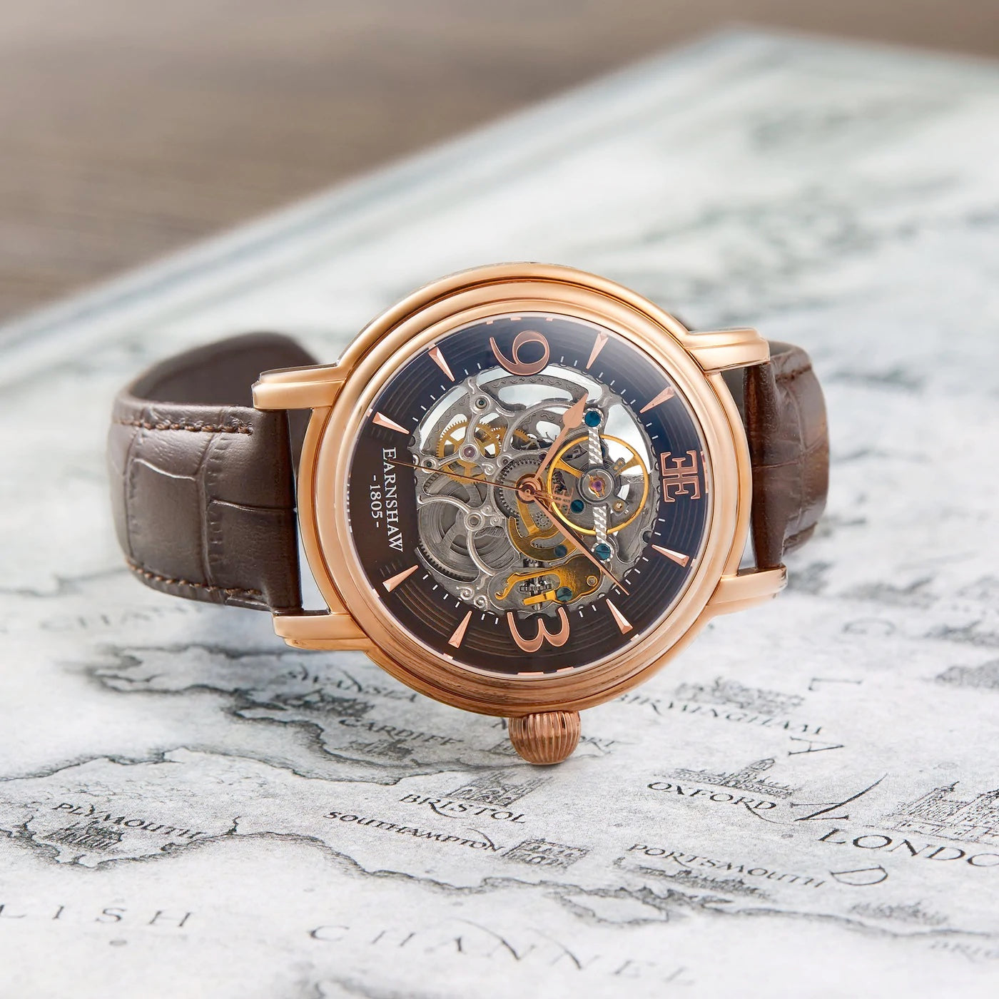 THOMAS EARNSHAW LONGCASE GRANDE SKELETON AUTOMATIC Brandy Rose Gold