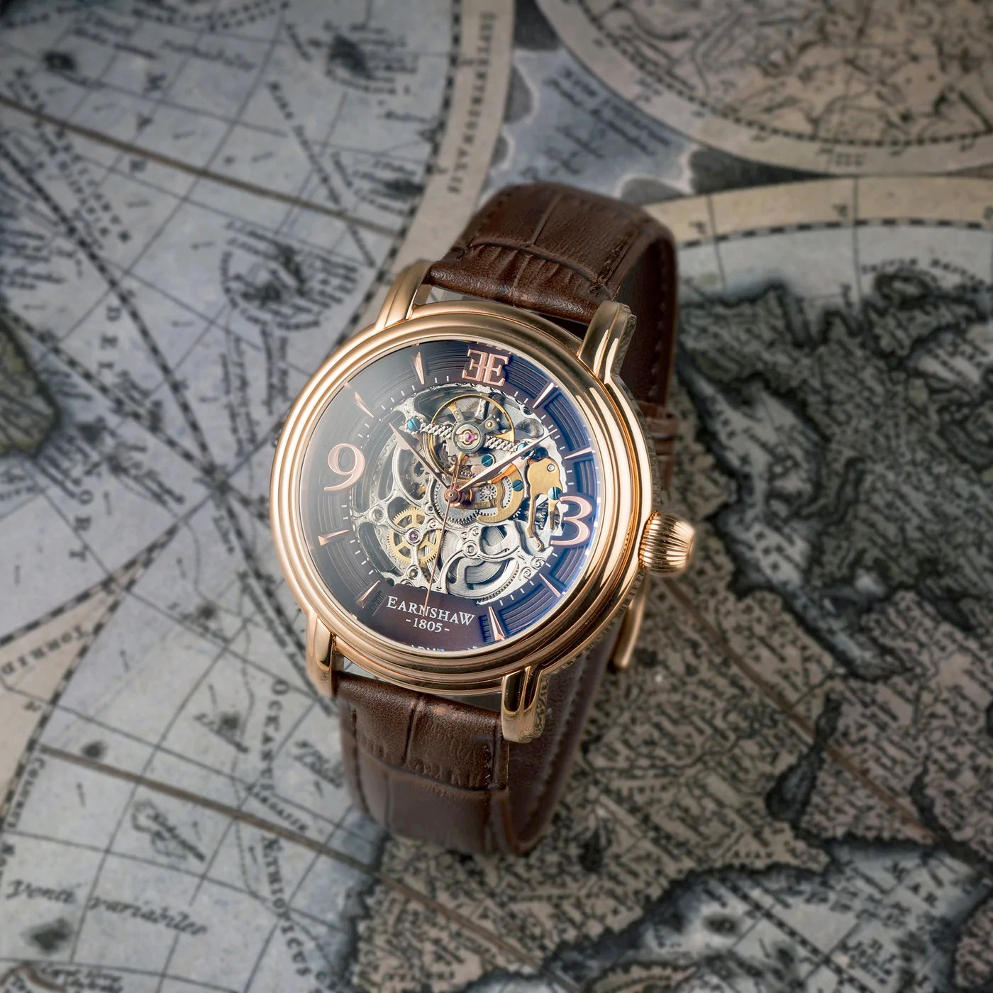 THOMAS EARNSHAW LONGCASE GRANDE SKELETON AUTOMATIC Brandy Rose Gold