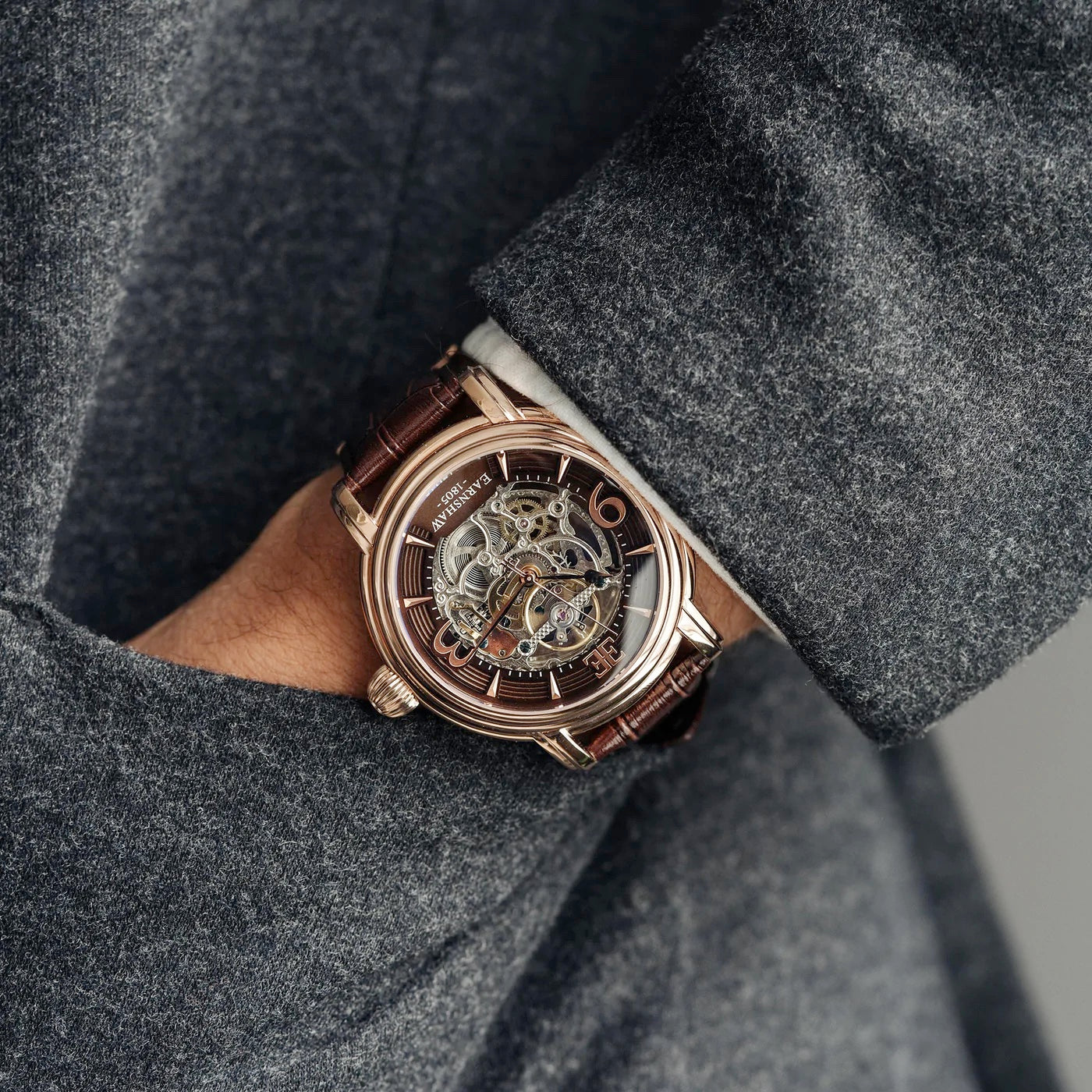 THOMAS EARNSHAW LONGCASE GRANDE SKELETON AUTOMATIC Brandy Rose Gold